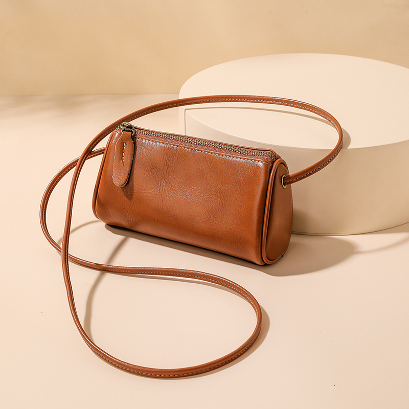 Designer 2025S genuine women spring new lightweight crossbody small oil wax soft cow leather feeling mini phone pillow bag