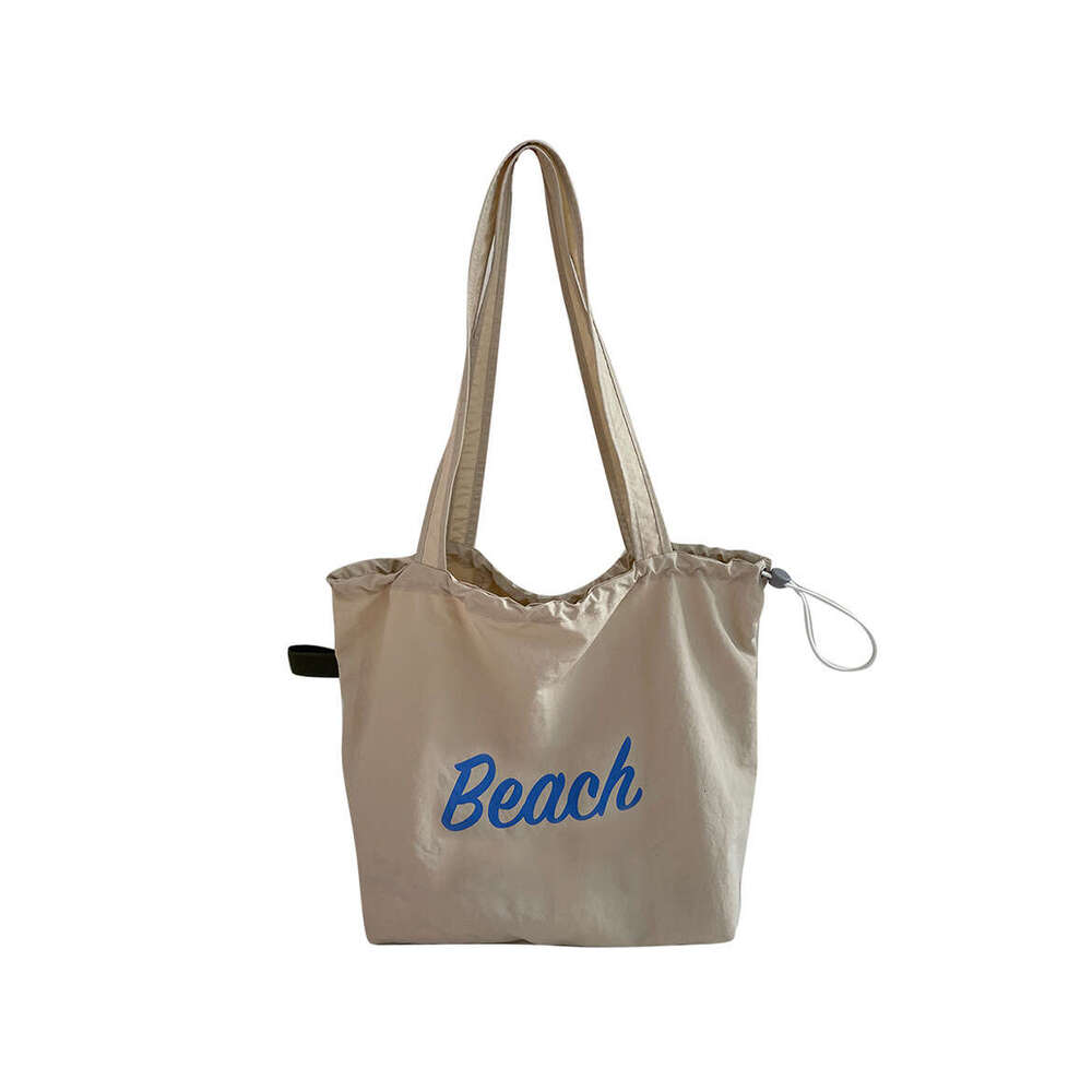 Korean version new letter printed women's large capacity nylon shoulder casual versatile portable drawstring tote bag