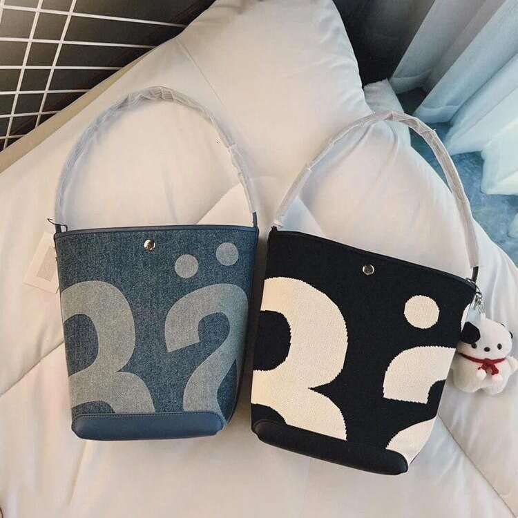 b5 Thailand Chaopai Large Capacity Bucket Bag 2024 New Water Washing Denim Knitted Letter armpit shoulder bag