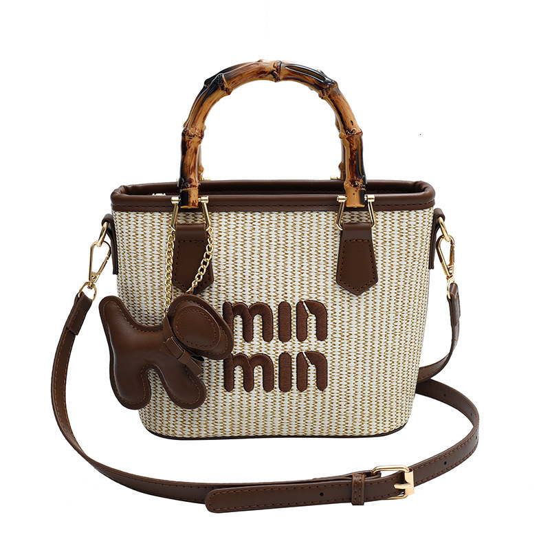 Designer 2025S New Spring Color Contrasting Grass Woven Bamboo Basket Water Bucket Handbag Fashion Shoulder Diagonal Cross Women Bag
