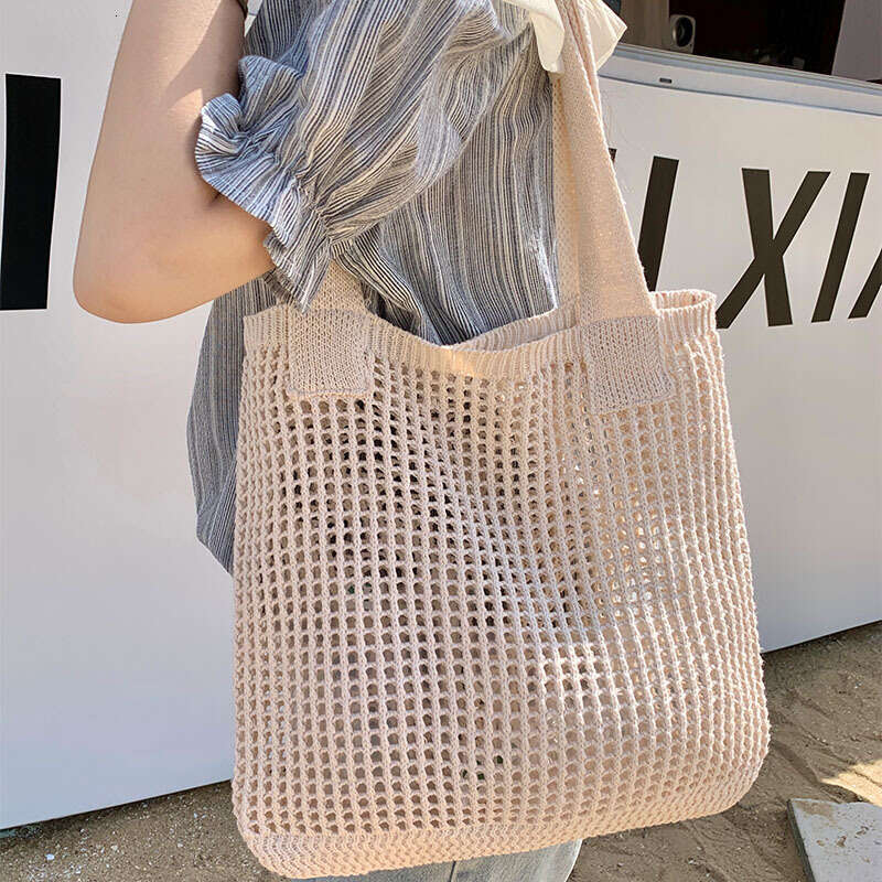 Summer niche versatile knitted simple woven mesh hollowed out women's shoulder bag, tote handbag