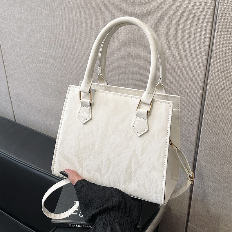 Hot selling fashion niche design folding small square handbag vintage fashion texture single shoulder crossbody bag