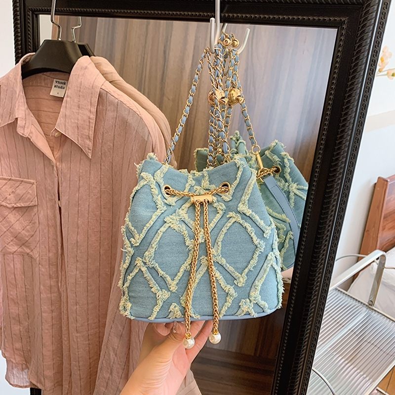Niche design bucket bag draw rope raw edge women's bag crossbody bag fashion simple shoulder bag