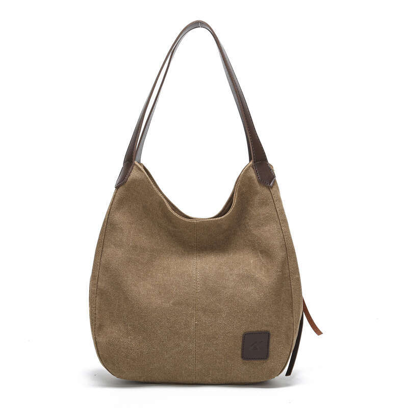 2025 new canvas women's bag, fashionable versatile, artistic and simple Korean version, single shoulder handbag, multiple compartments, casual la