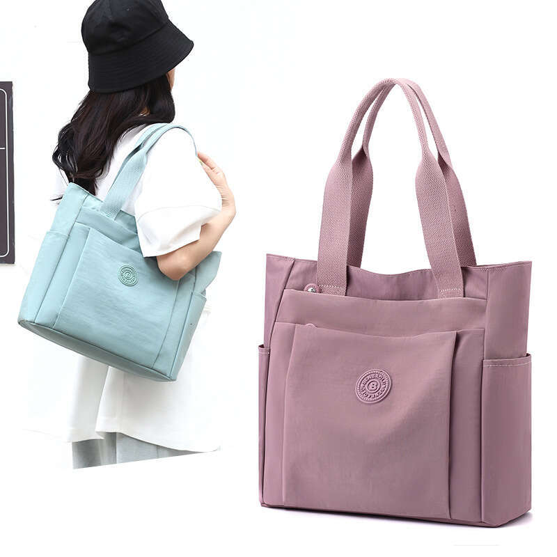 d1 Casual women's handbag style 2024 summer new large capacity casual solid color nylon cloth single shoulder hand-held mother bag