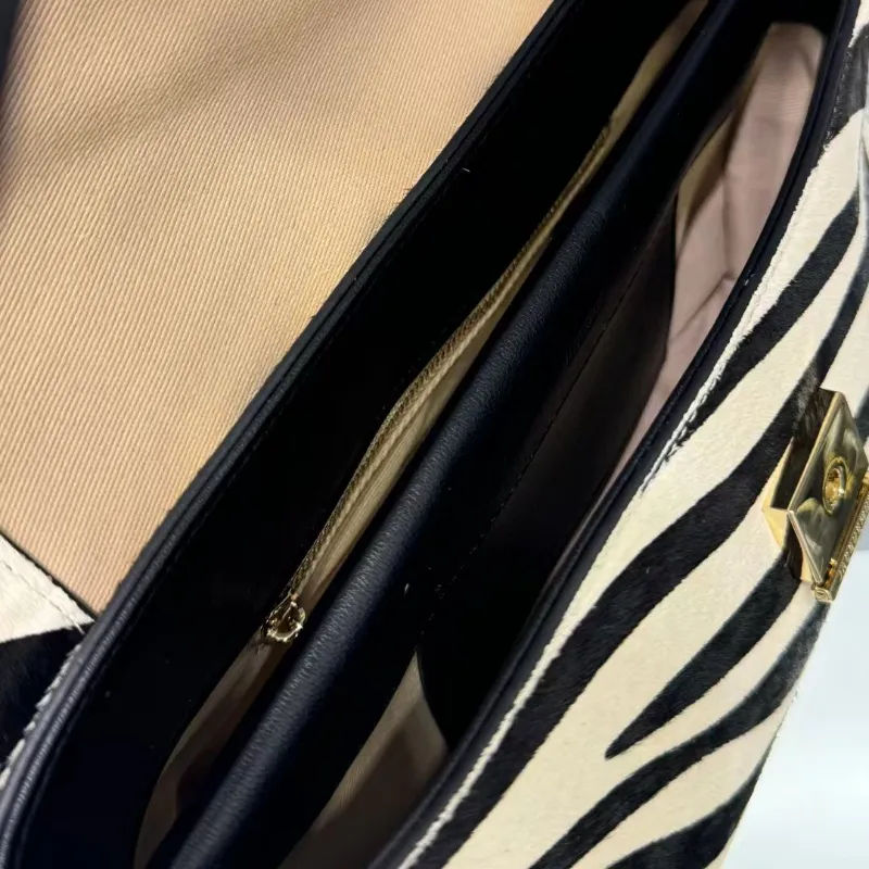 Chic Female Accessory: Rond Carre Design Zebra Stripe Leather Shoulder Bag Featuring Premium Horse Hair Detailing
