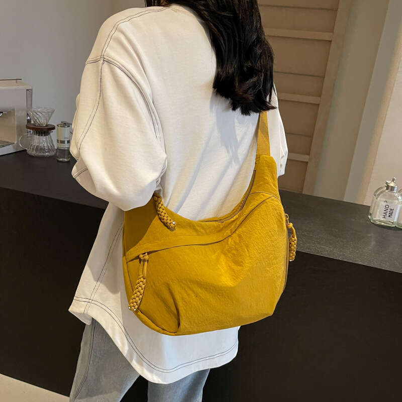 Simple and large capacity crossbody 2024 new style student small single shoulder cloth bag, versatile dumpling bag for women