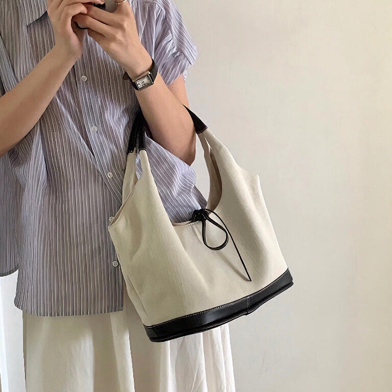 2025S Fashion Designer Korean Bow Niche Canvas Patchwork Single Shoulder Underarm With Large Capacity Simple Commuting Fashion Portable Tote Bag