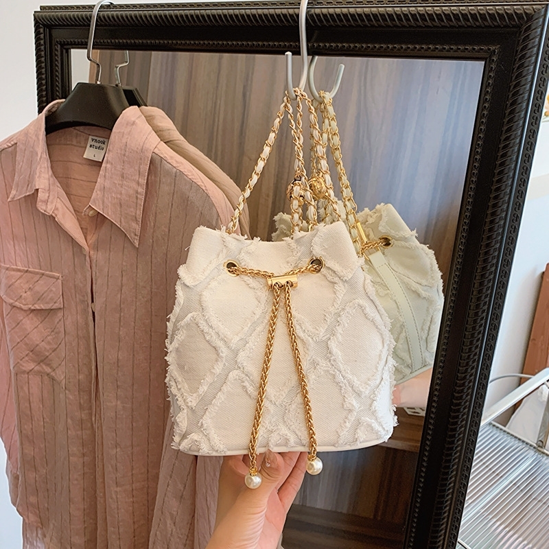 Niche design bucket bag draw rope raw edge women's bag crossbody bag fashion simple shoulder bag