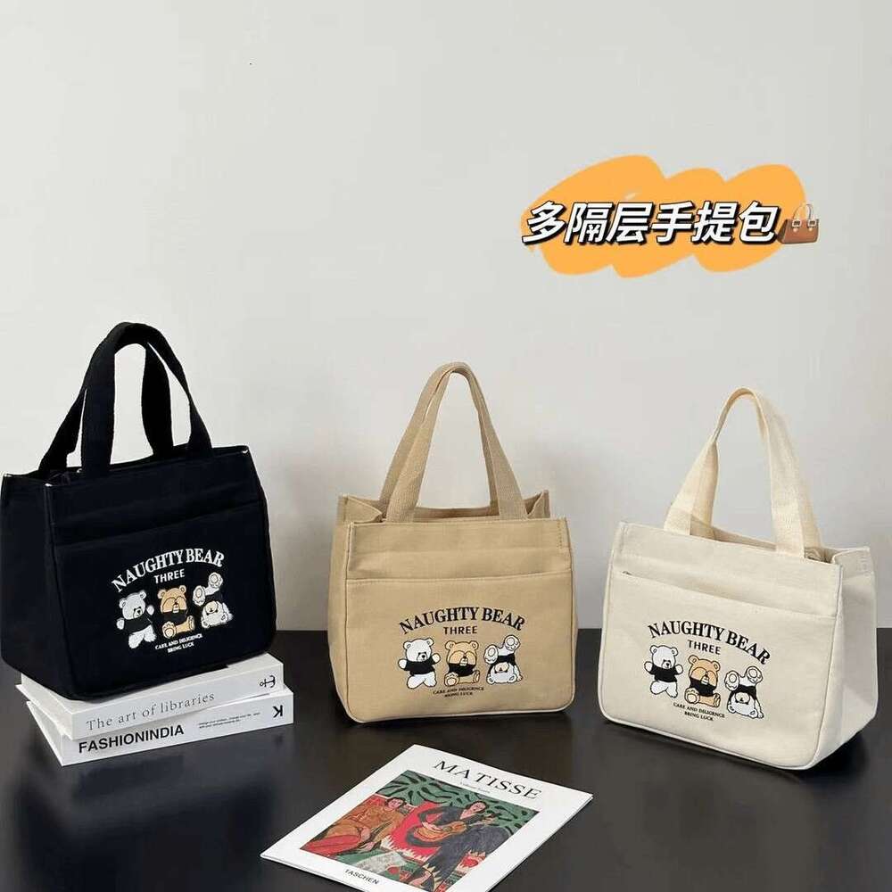 High aesthetic canvas handbag moms to go out, simple and compact, three-dimensional carrying commuting, thick for work, lunch box, rice bag
