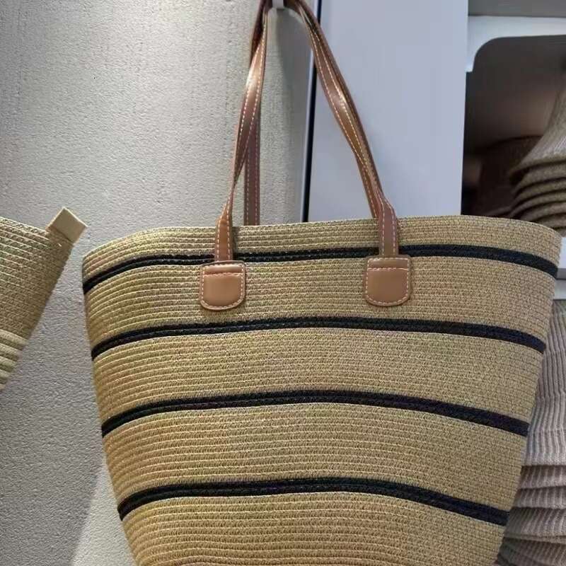 ca Women's ins new simple and fashionable grass woven large capacity armpit single shoulder hollow weave beach bag for women