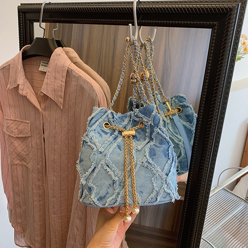 Niche design bucket bag draw rope raw edge women's bag crossbody bag fashion simple shoulder bag