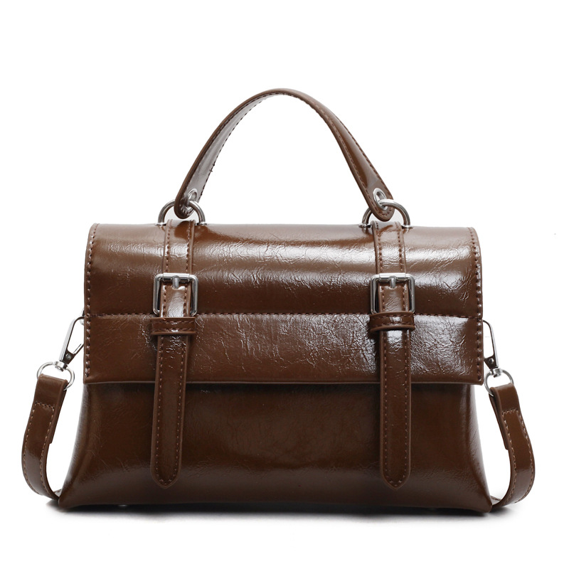 free shipping College wind large capacity handbag female early spring new solid color shoulder bag texture
