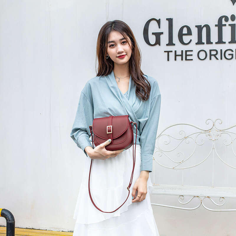 26 2025 Japanese and Korean New Fashionable Versatile Semi Shaped Saddle Belt Style Single Shoulder Diagonal Cross Women's Bag Trend