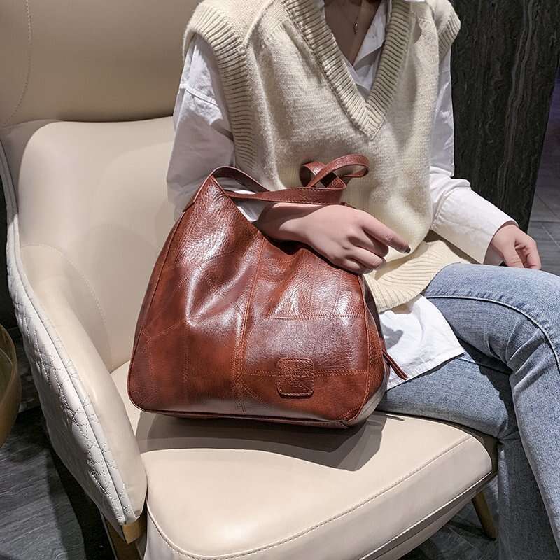 Soft leather handbag 2021 new women's large capacity simple shoulder multi compartment tote bag