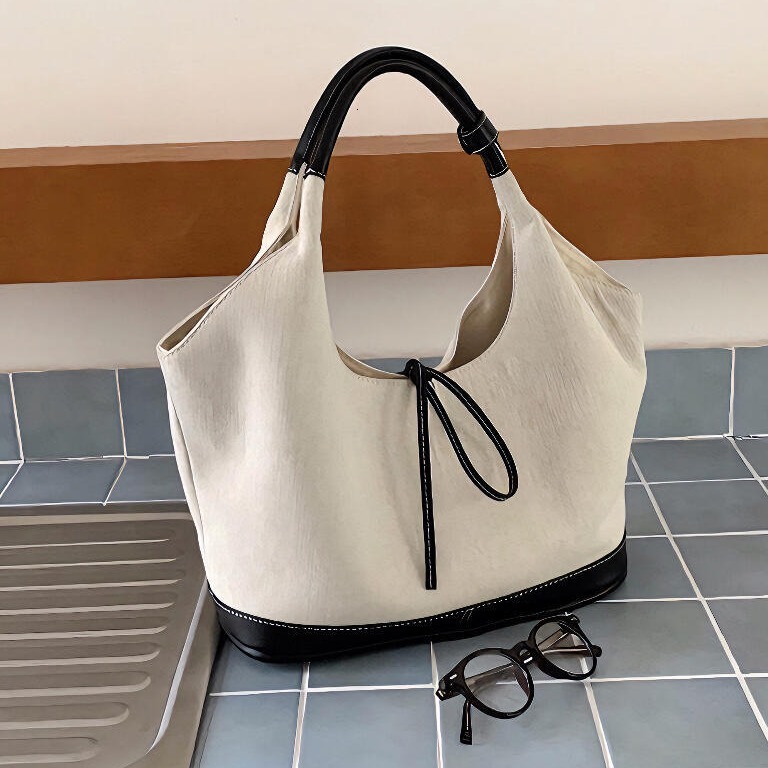 2025S Fashion Designer Korean Bow Niche Canvas Patchwork Single Shoulder Underarm With Large Capacity Simple Commuting Fashion Portable Tote Bag