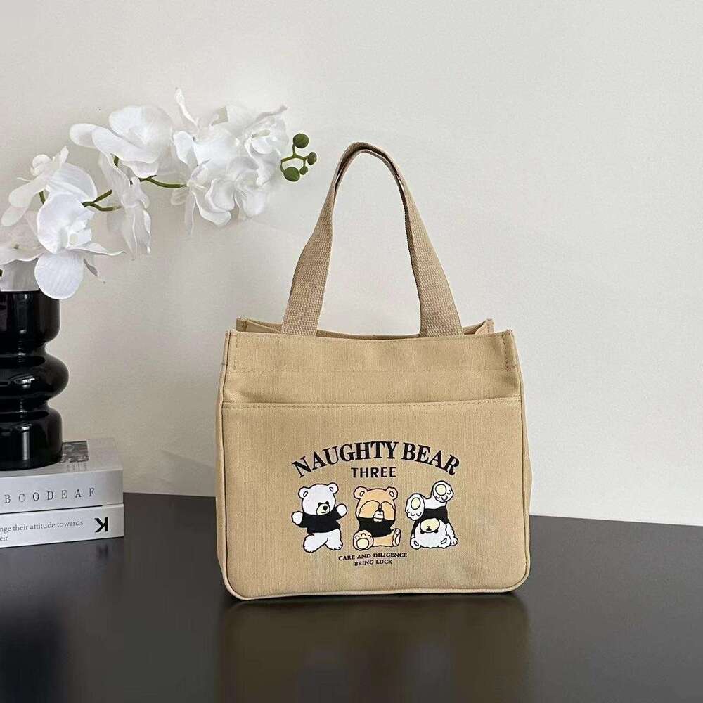 High aesthetic canvas handbag moms to go out, simple and compact, three-dimensional carrying commuting, thick for work, lunch box, rice bag