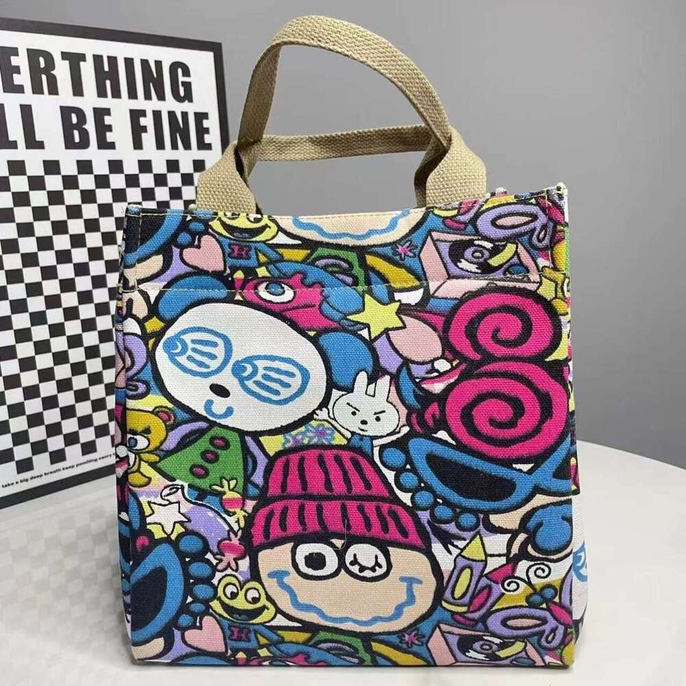 2024 new cute and stylish canvas with large capacity office use, lunch box bag for moms to go out, fashionable handbag