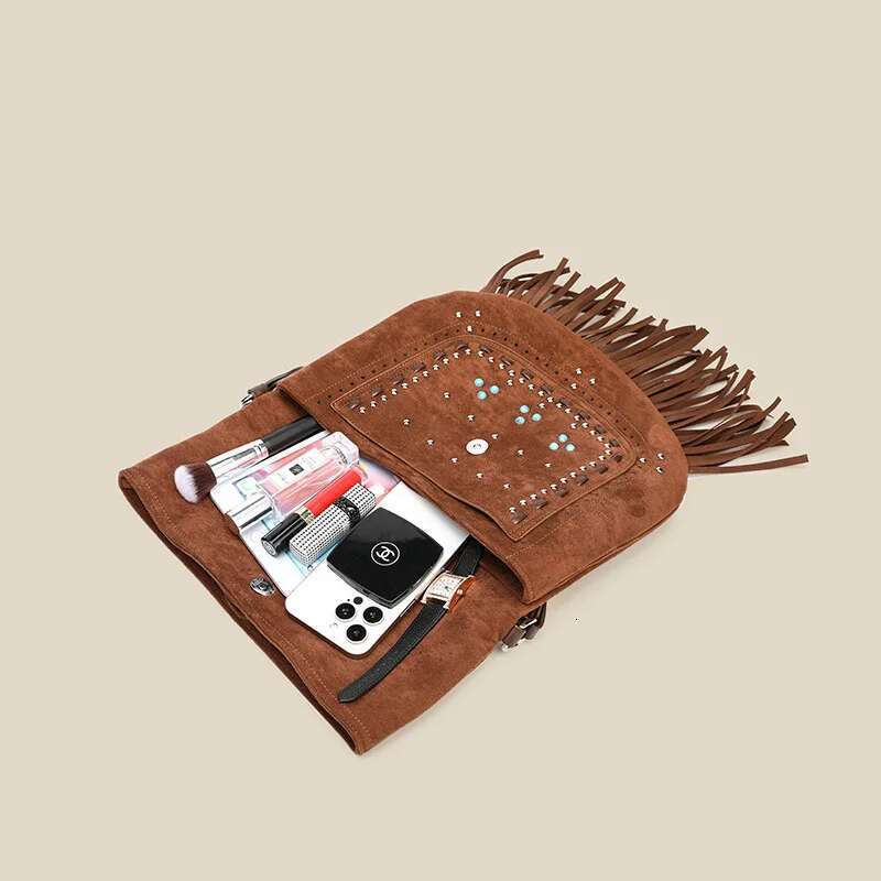 2025 New Retro Women's Bohemian Faux Suede Fabric Hollow Handbag Multifunctional Frosted Willow Nail Tassel Shoulder Underarm Ba