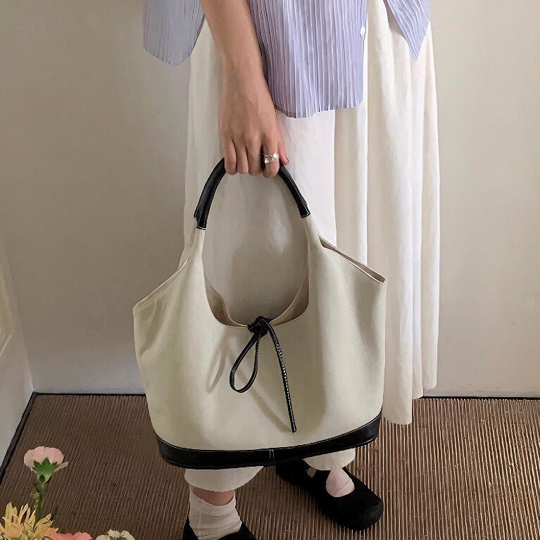 2025S Fashion Designer Korean Bow Niche Canvas Patchwork Single Shoulder Underarm With Large Capacity Simple Commuting Fashion Portable Tote Bag