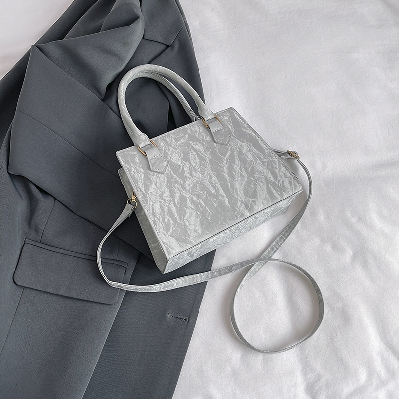 Free shipping Fashion niche design folding hand bag small square retro fashion texture single shoulder crossbody bag