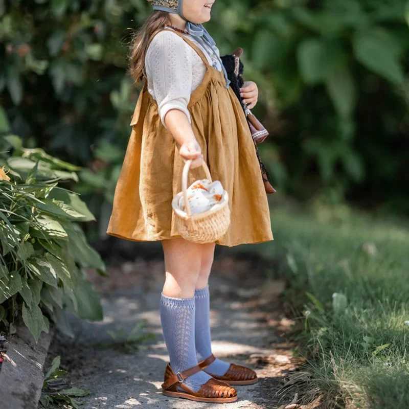 Retro girl adjustable shoulder strap linen fluffy leather autumn new French cotton linen casual loose childrens princess dress W250326