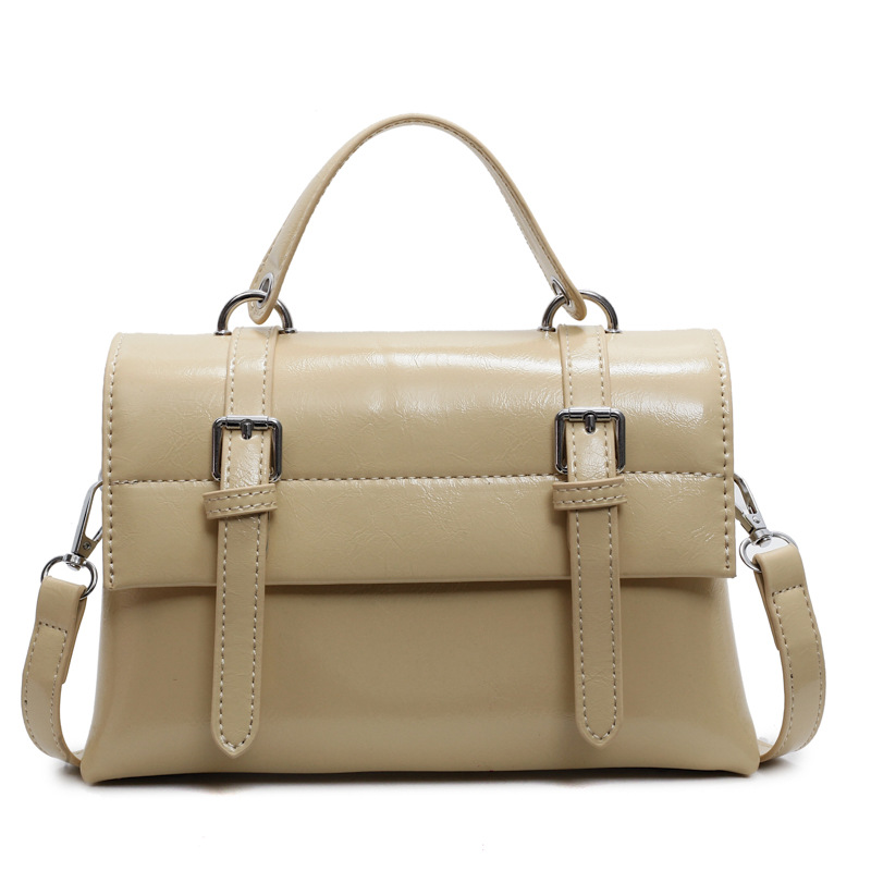free shipping College wind large capacity handbag female early spring new solid color shoulder bag texture