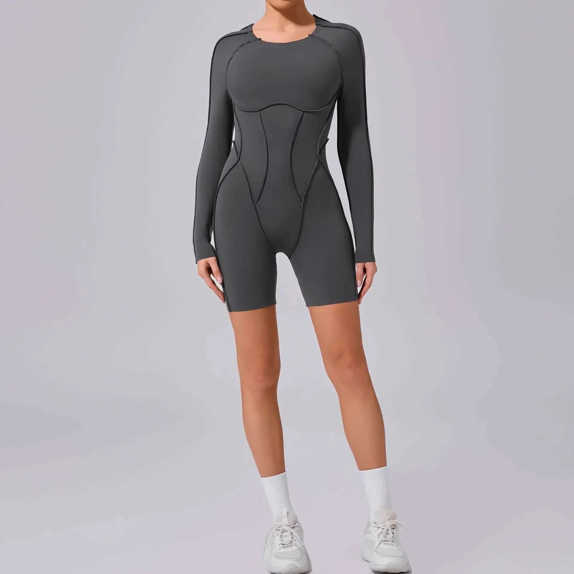 Seamless yoga jumpsuit sports and fitness splicing hip lifting integrated tight fitting hollow beauty back fitness suit W250326