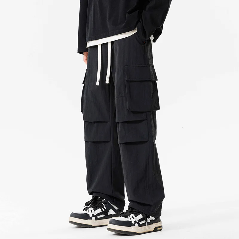 Work pants mens umbrella style assault pants outdoor waterproof loose size straight casual mens work clothes 250321