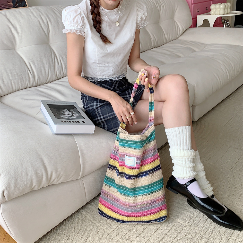 Wool knit handbag women's new color rainbow stripes armpit shoulder braided bag 2025s hot