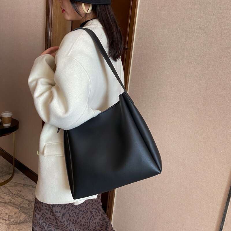 e1 High quality and large capacity shoulder bags, 2025 casual women's baozi mother tote bag