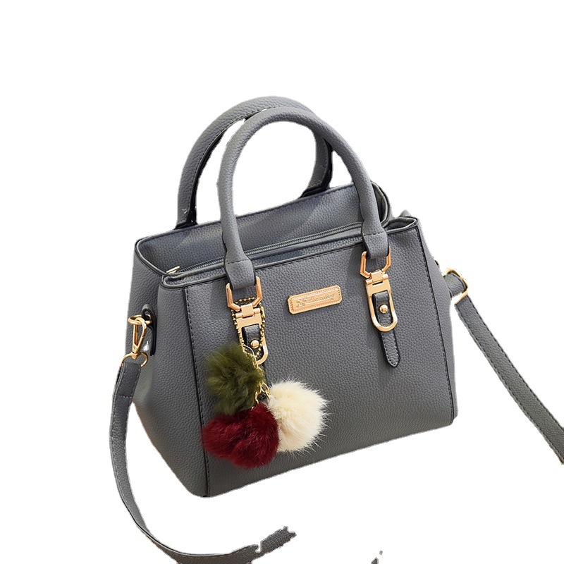 Bag women's new fashion single shoulder small bag double large capacity hairball hand oblique span women's bag