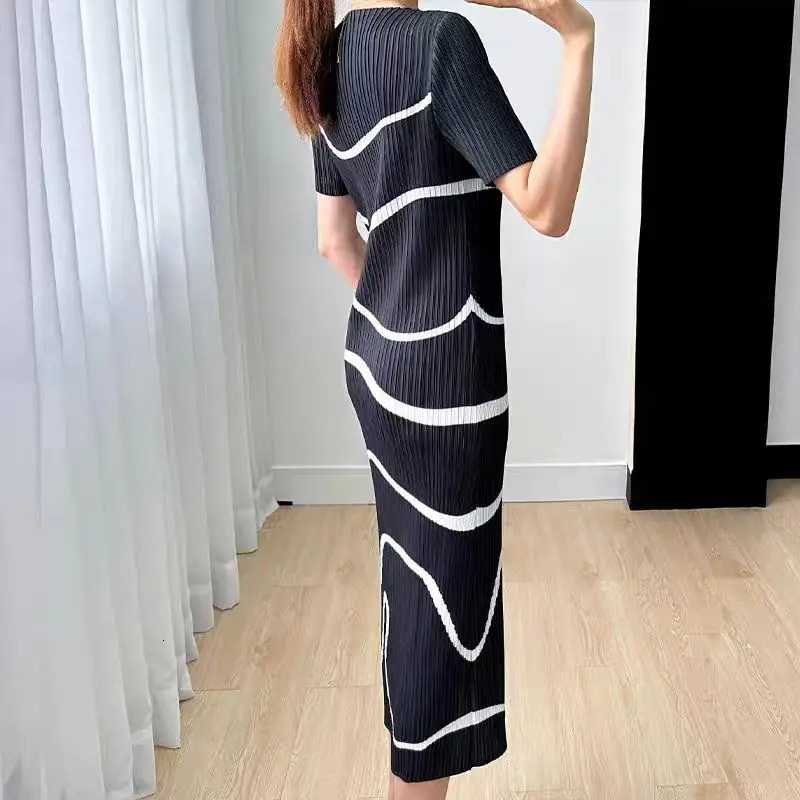 MIYAKE pleated dress irregular stripes Japanese n elegant casual loose short sleeved long skirt summer 2024 item 250324