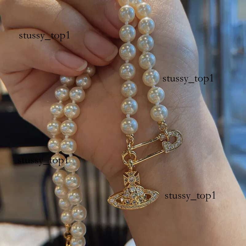 Viviennen West Wood Nacklaces Designer Western Empress Dowagers Hot Saturn Pearl Viviennen Necklace Womens High Edition Star Full Diamond Collar Chain Pink 893