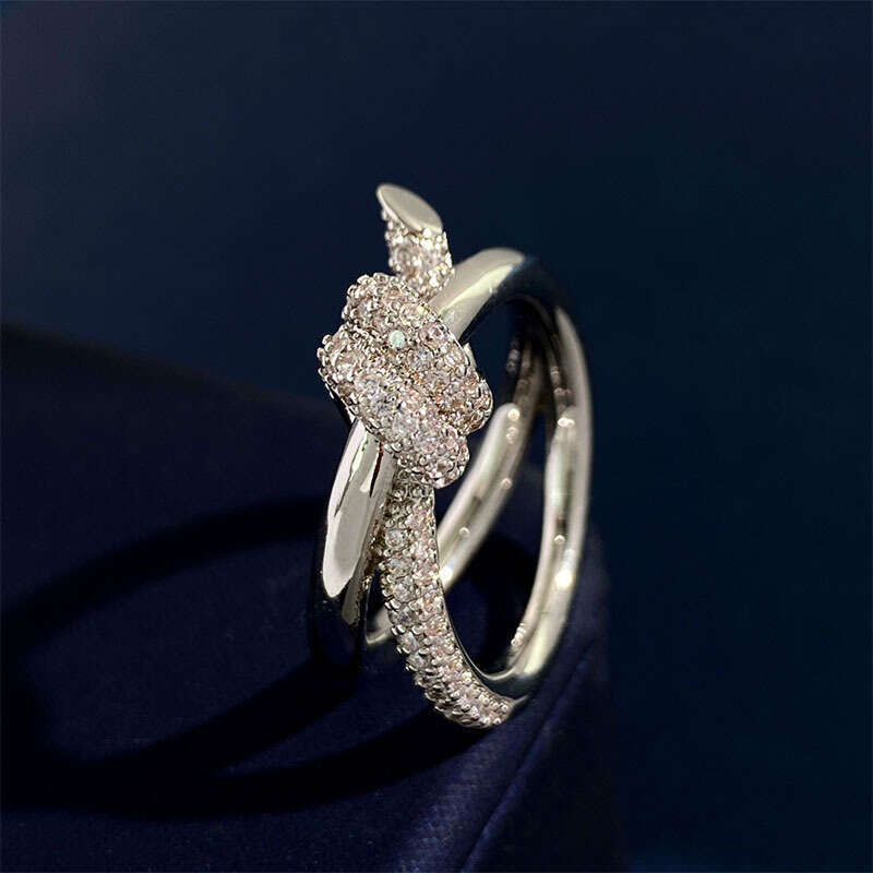Knot Ring by Gu Ailing Song Yi, with a niche design, fashionable, luxurious, diamond studded, double twisted knot ring for women