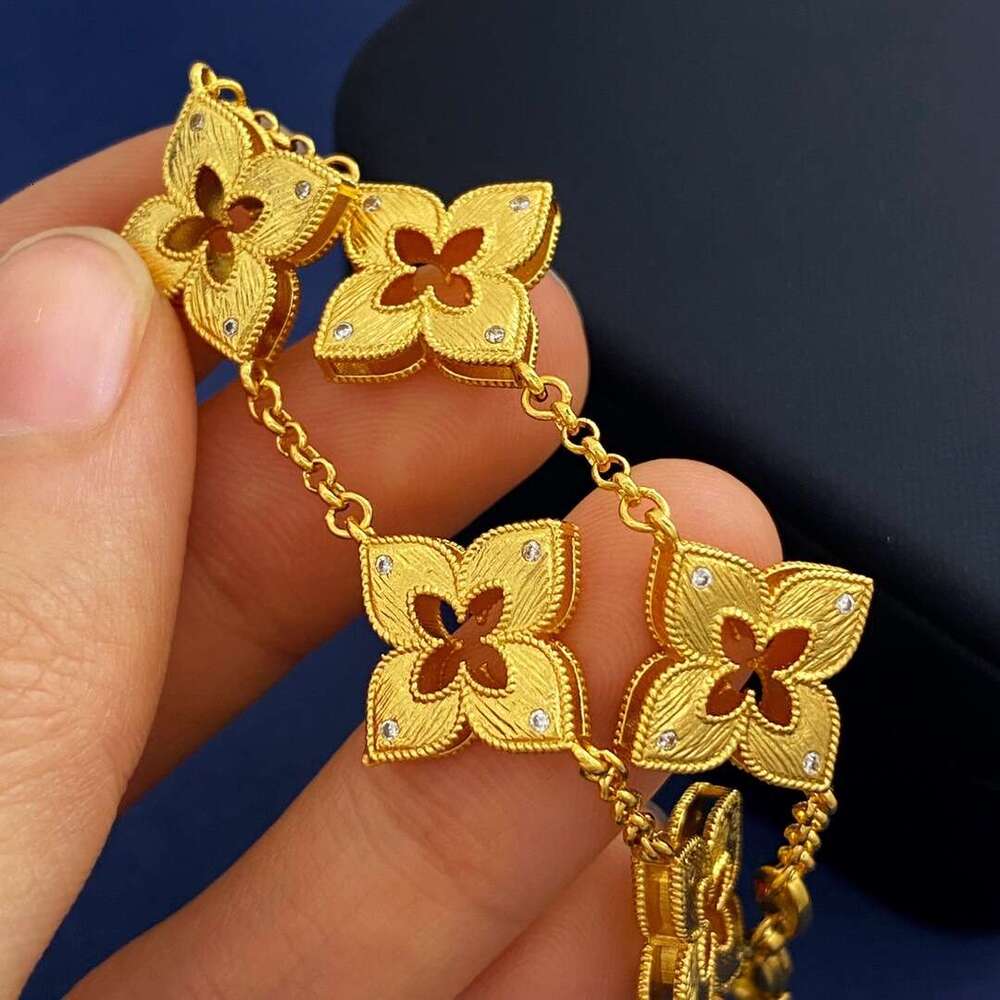 New Italian style four leaf inlaid with small white dia, metal brushed hollow out, carved and engraved five wer bracelet