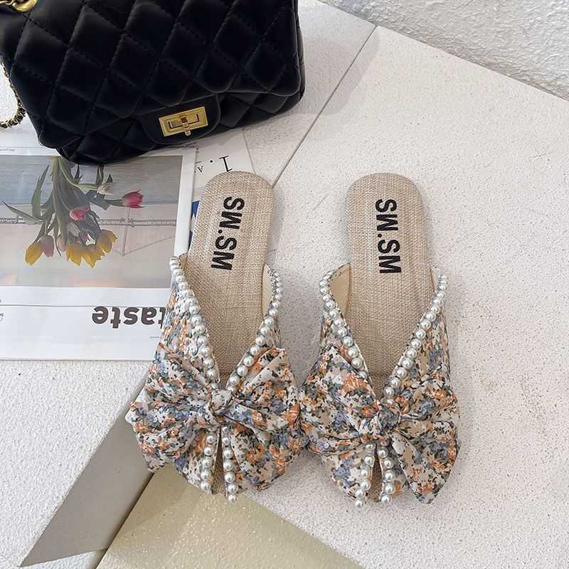 Slipper Baotou cool drag womens new 2022 summer out wear fashion flat bottomed versatile small flower beach drag lazy people half drag tide S25326