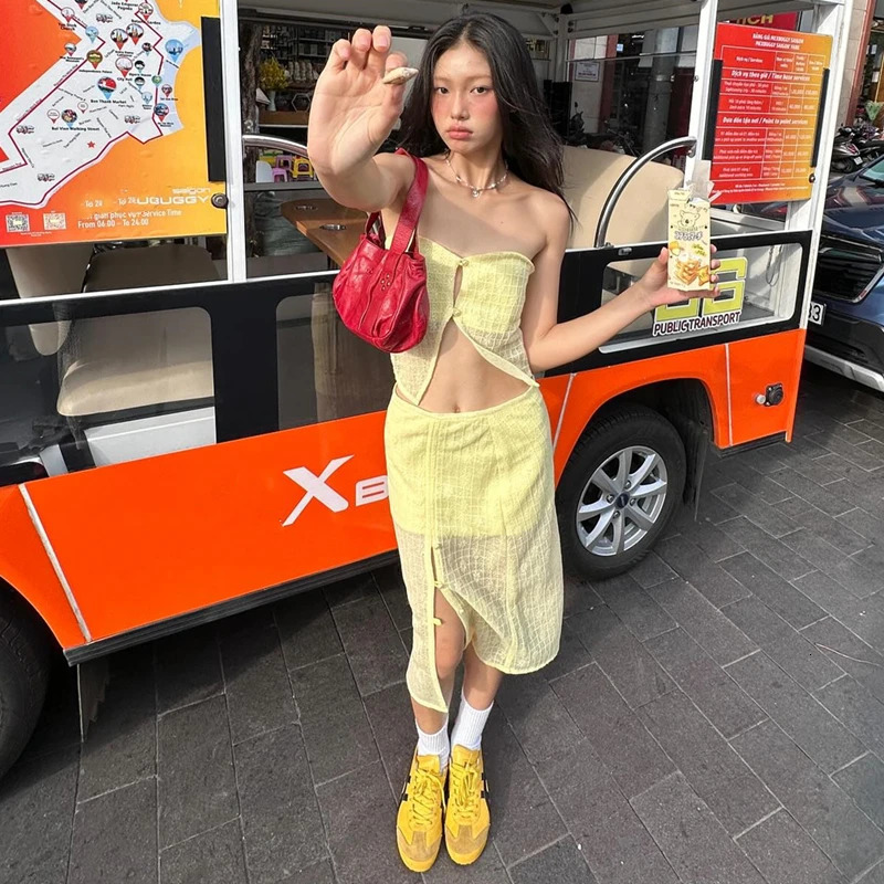 Among them the casual summer hollow womens twopiece set sleeveless shoulder top and high waisted long clothing 250326