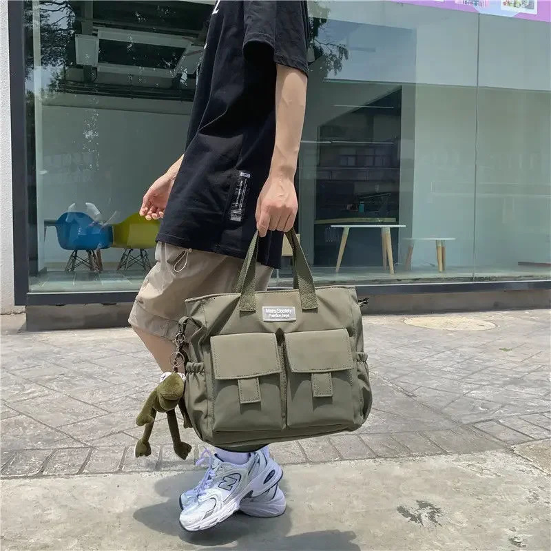 Waterproof shoulder bag womens multi pocket nylon messenger prefabricated canvas handbag 250326