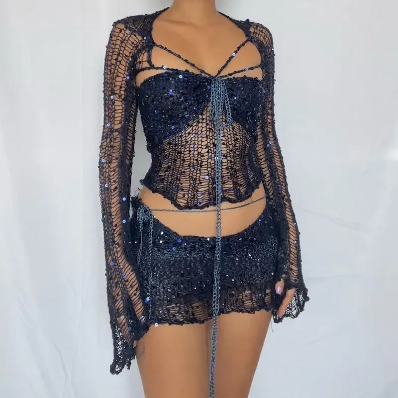 Sexy sequin knitted hollow two-piece set womens long sleeved cut top mini skirt fashionable womens clothing 250326