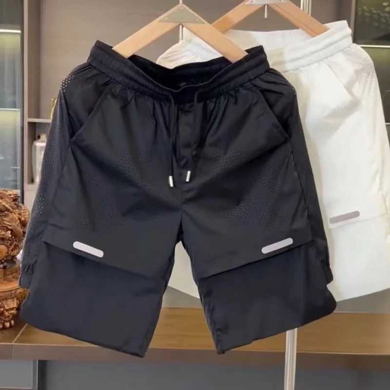 2024 Summer New Mens Breathable Perforated Ice Silk Short Sleeve Set Loose Quick Drying Sports and Leisure Two Piece SetXJ250326