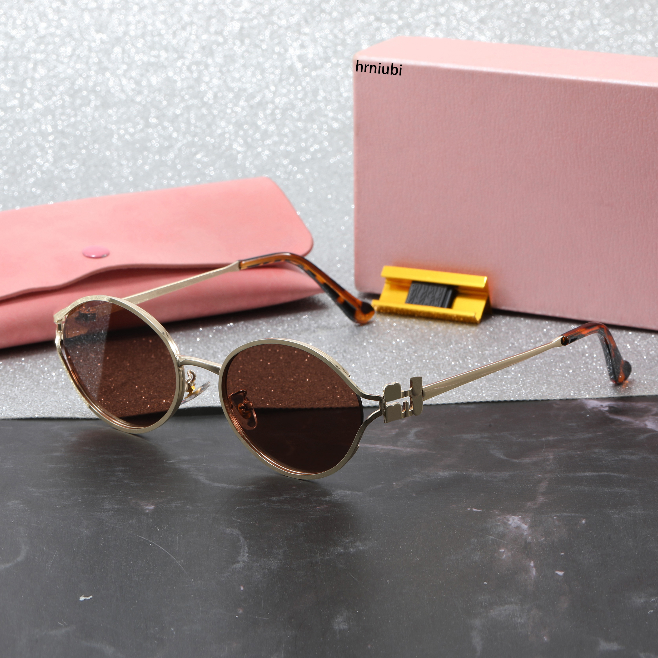 Designer sunglasses for women luxury metal letter temples fashion trend rimless outdoor travel premium sunglasses Oval frame holiday shopping matching