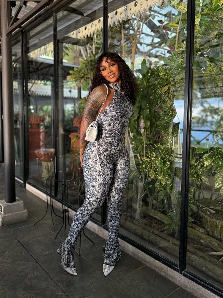 Strange cat peach button jumpsuit womens sexy summer backless sleeveless tight fitting Arab midnight stretch streetwear jacket 250326