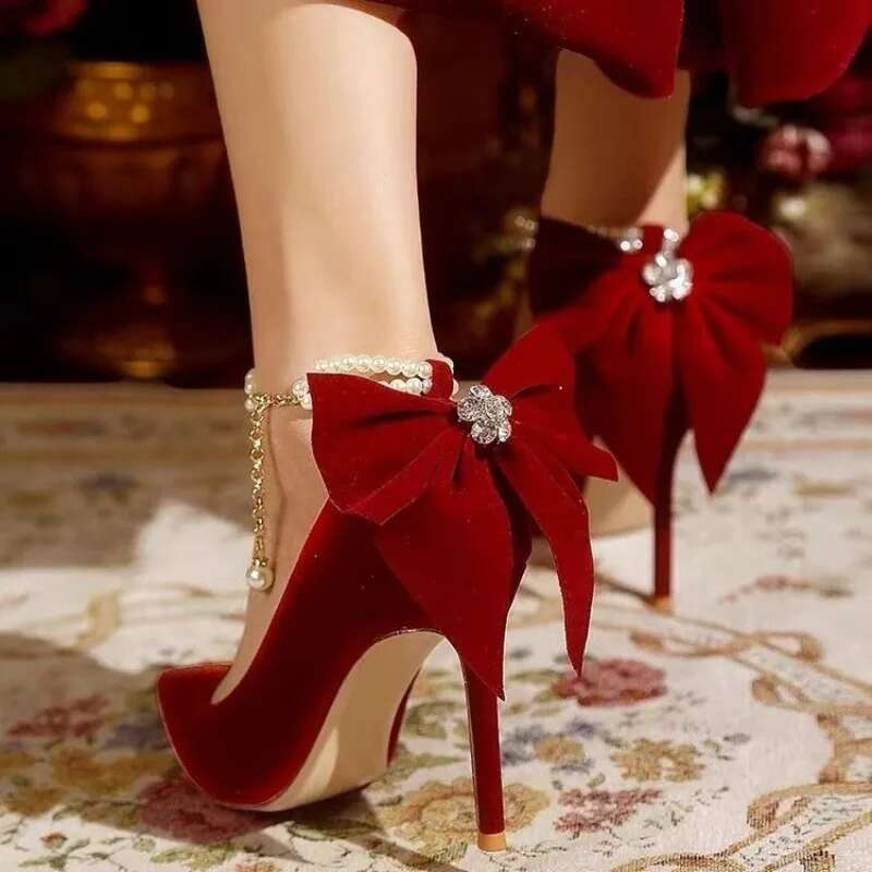 Red Xiuhe wedding new pointy stiletto high heels female shallow mouth bow pearl one word buckle strap two wear bride shoes