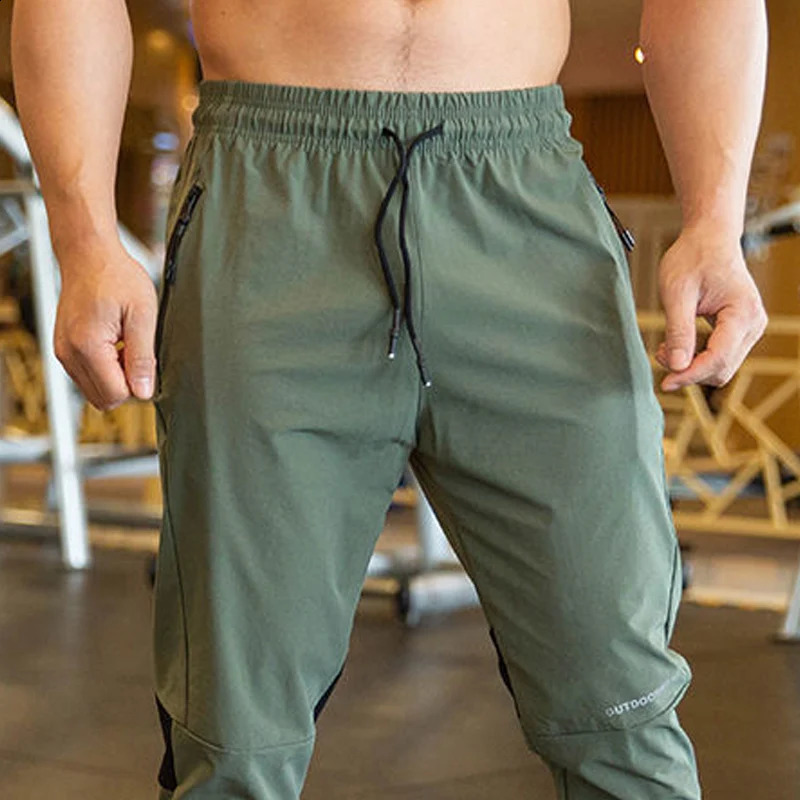 2024 Summer Thin Style Ice Silk Fabric Motion Trousers Man Solid Color Elastic Waist Quick Drying Loose Bodybuilding Sweatpants 250317