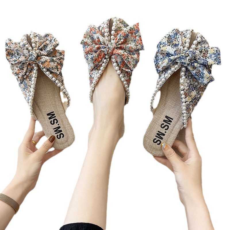 Slipper Baotou cool drag womens new 2022 summer out wear fashion flat bottomed versatile small flower beach drag lazy people half drag tide S25326