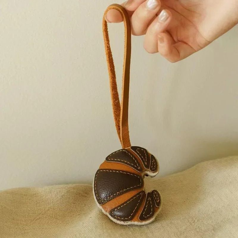 Handmade leather sheepskin croissant charme keychain girl mobile phone case pendant gift bag decoration accessories250325