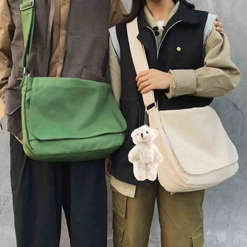 Fashion canvas cross shaped youth bag shoulder womens casual large organizer outdoor messenger with pendant for men 250326