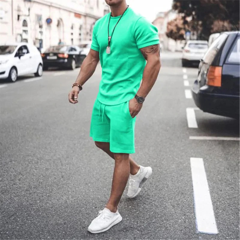 Solid color European and American mens 13 summer short sleeved Tshirtshort 2piece casual sports set 250327
