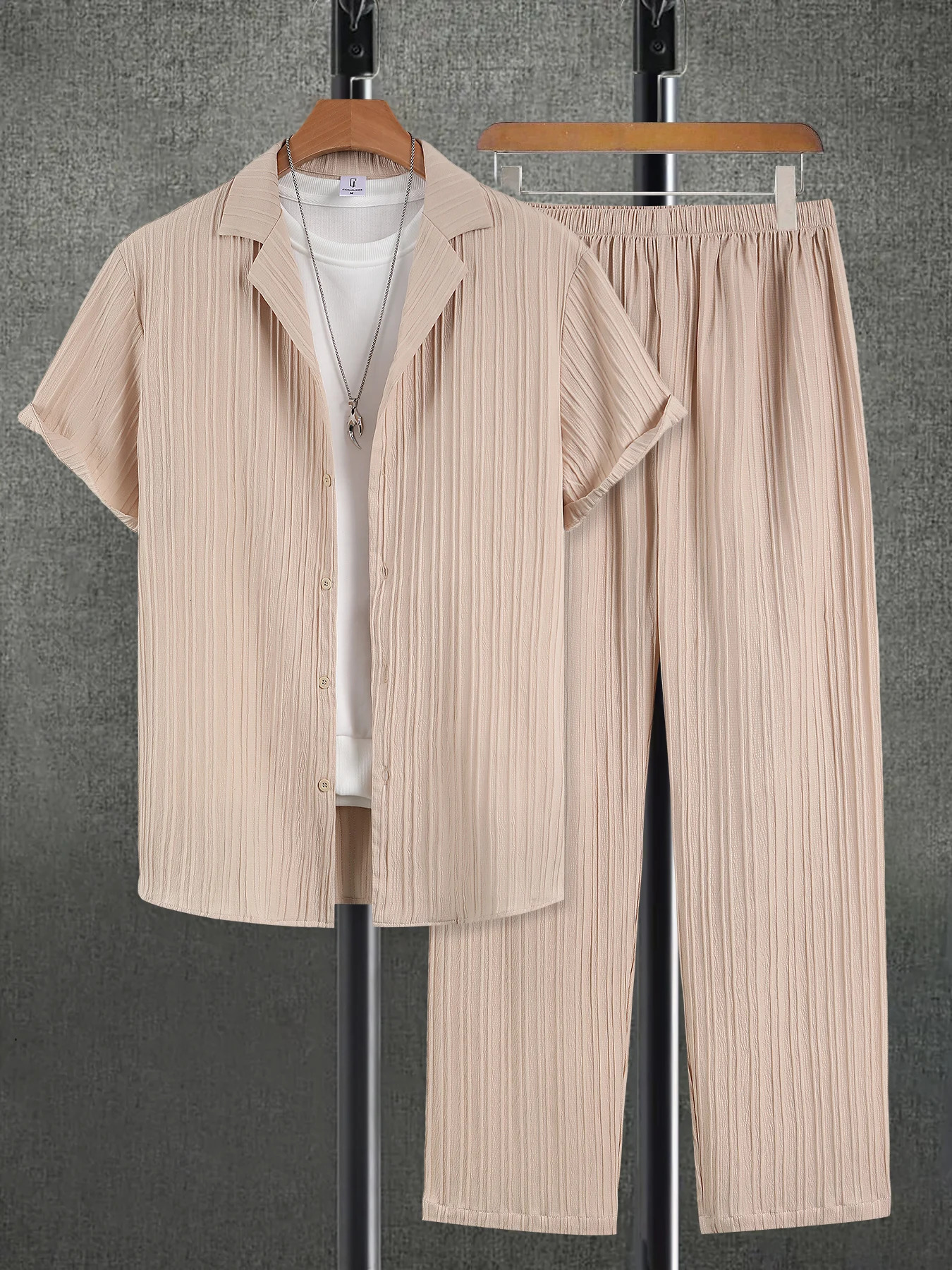 Mens twopiece casual suit clothing solid color texture short sleeved buttons shirt and pants 250326